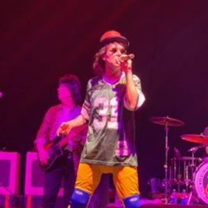 Image of a relaxed elderly couple by the sea