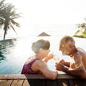 Image of a relaxed elderly couple on vacation
