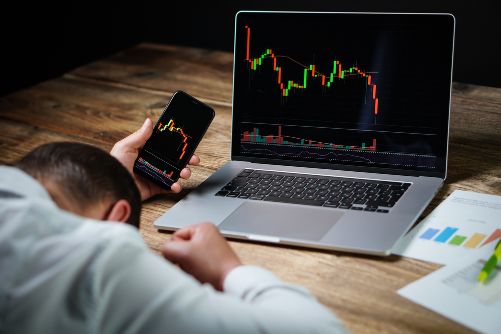 Sad Investor Looking at a Chart