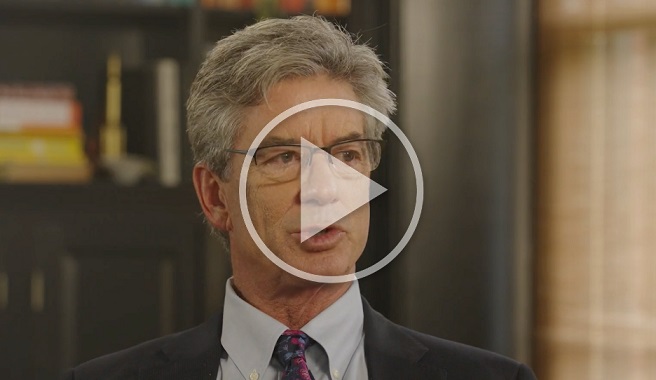 Alexander Green image with play button