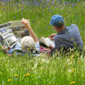 Couple Reads the Newspaper