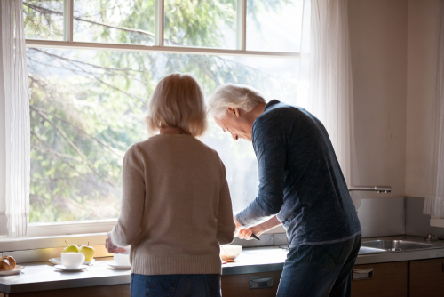 Older Couple Preparing a Drink