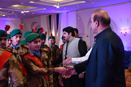 Zamurrad khan greeting with cadet college students