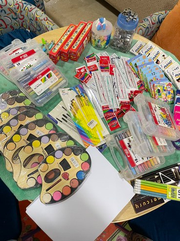 Colors , paints and paint brushes for art on car campaign for PSH children