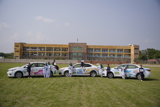 PSH children with their drawings and indrive cars