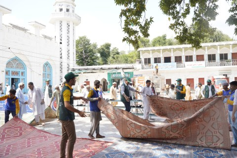 Zamurrad Khan with Uni students cleaning Mosque in Buner