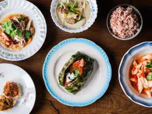 This is an image of a variety of dishes from som saa, a restaurant in London