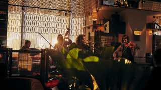 This is a picture of a live music performance at Decimo