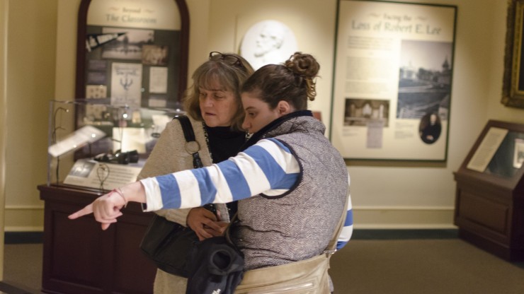 Teachers participate in a museum activity designed to engage students with the scientific equipment located in Lee Chapel’s museum.