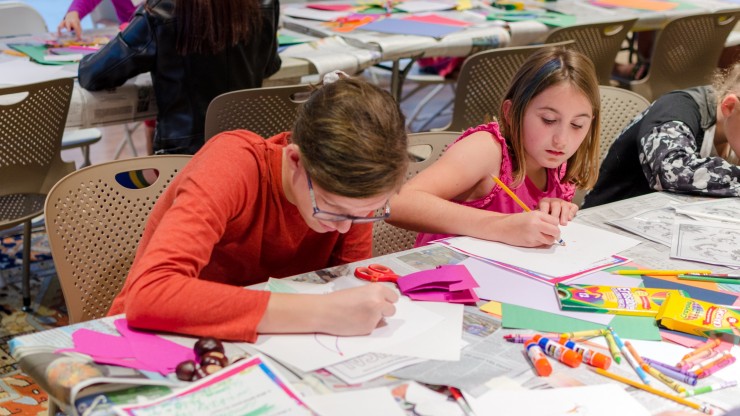 Inspired by the paintings around them, children create works of art at the Reeves Museum.