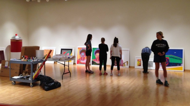WLU students installing Modern Arts Goes Pop exhibit