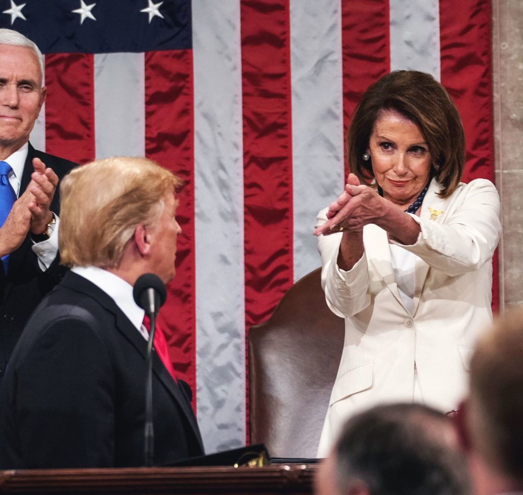 Nancy Pelosi applauding Trump