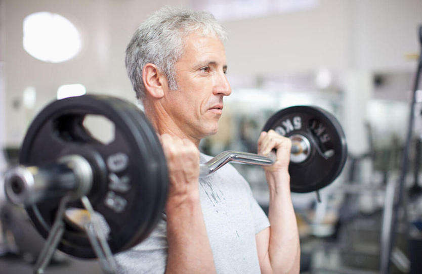 old man lifting weight