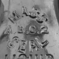 A.B.C.2 Seal<br />
The fragment features part of this Atlantic Bottle Co. “A.B.C.2” style seal, in compliance with Massachusetts’ institutional efforts to standardize labeling.