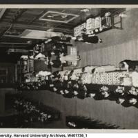 Birds-eye view of the main dining room at the Harvard Union.<br />
This view of the Harvard Union highlights the quantities of milk procured for the dining services; large jugs of milk were used, rather than small bottles like the fragment found.