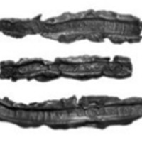 The window maker's initials were often found on the lead casing.  This was not visible in a completed window but instead served to identify failed window makers.