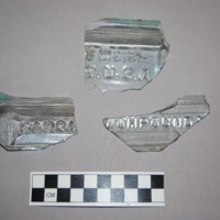 Embossed words visible include “COMPOUND” and “SARSA” as well as “U.S.A.” and the second half of the name of the city of Lowell, where the bottle was manufactured.