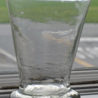 A picture of a tavern glass, or a "thumper", that could have been used at Bush Tavern.