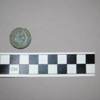 In the hurried production of the coin, some of the 1864 minted pieces were accidentally made with a smaller motto.