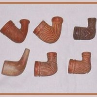 Red clay tobacco pipe bowls from Pamplin, Virginia.