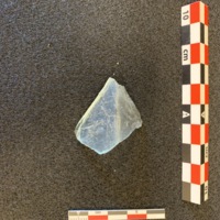 Clear glass bottle fragment