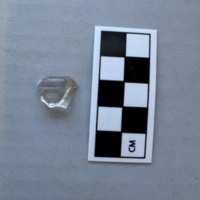 Clear medicine bottle lip fragment
