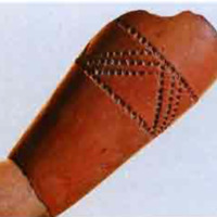A red clay pipe from the Nomini plantation,