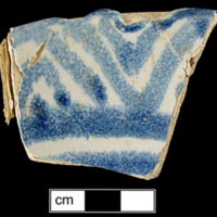 Example of another tin-glazed earthenware sherd with geometric motif.