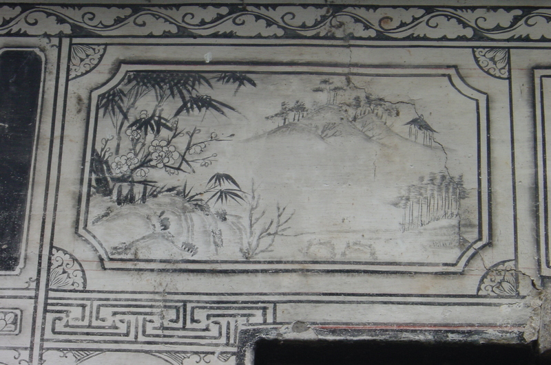 Landscape painting on the left-hand side of the wall