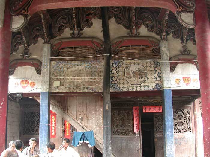 Overview of upper wall with four old paintings Overview of upper wall with four old paintings