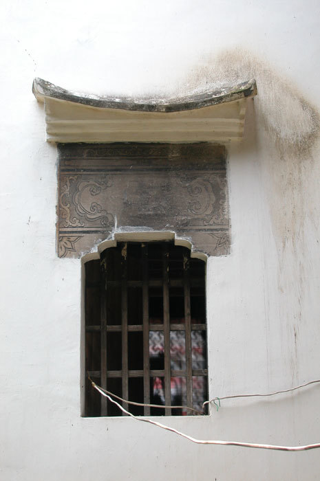 Far wall with window