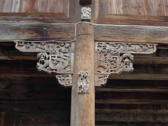 Bracket carved with landscape themes