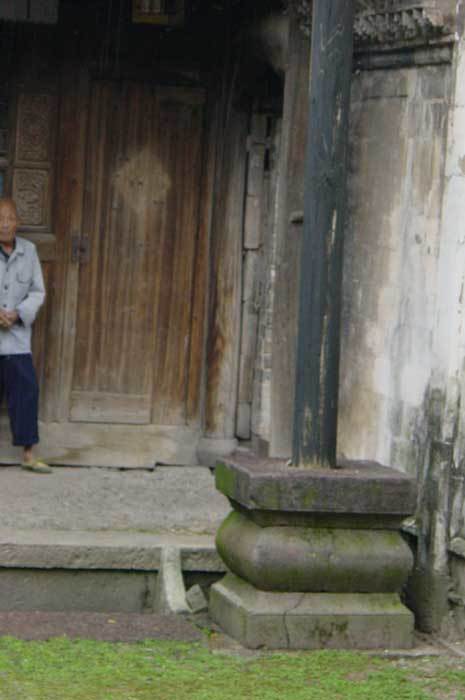 Flagpole base on the left-hand side of the front gate