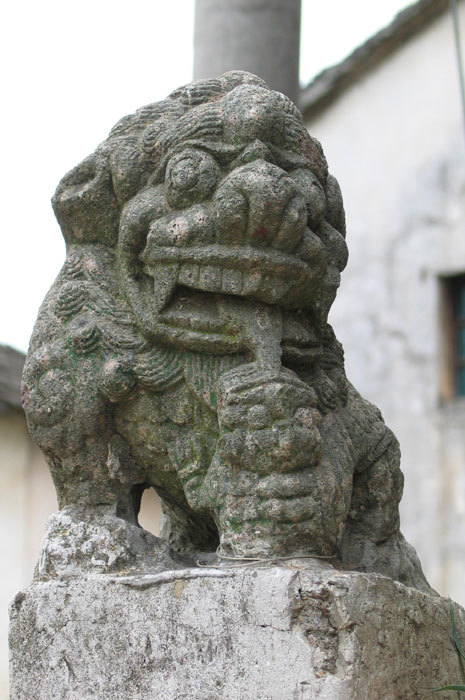left side lion statue on opera stage