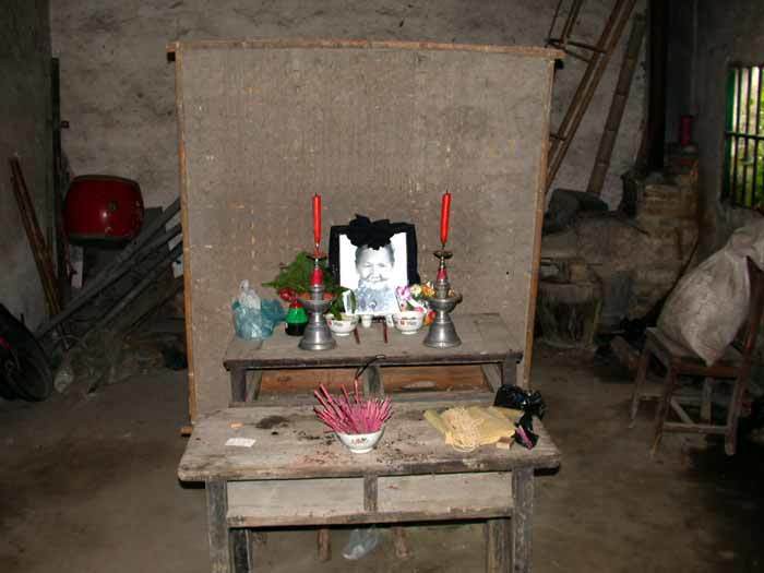 House of Great Peace.the altar table for an old woman who just passed away House of Great Peace.the altar table for an old woman who just passed away