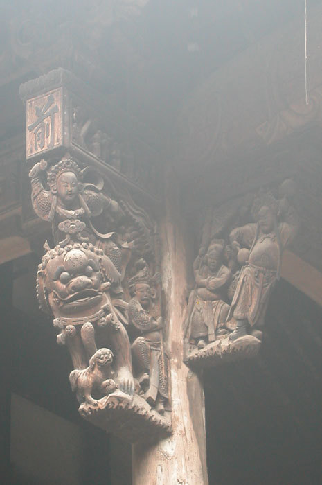 bracket of man on mythical beast