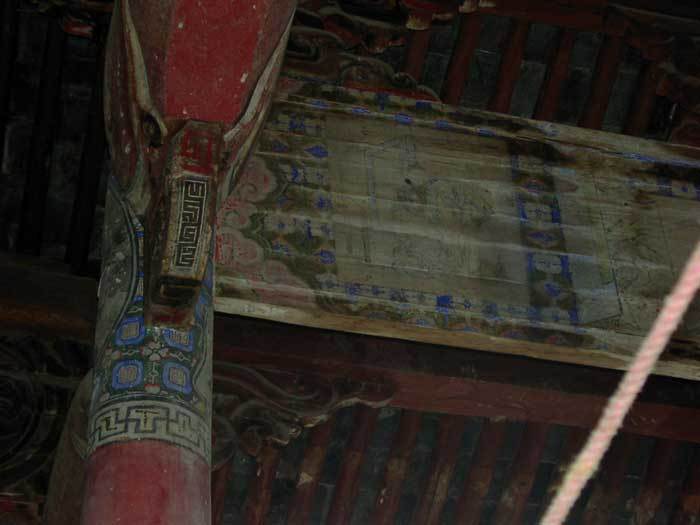 Closeup of a painting on a beam