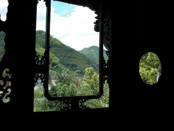 Looking outside of the window on the right-hand side of the statues