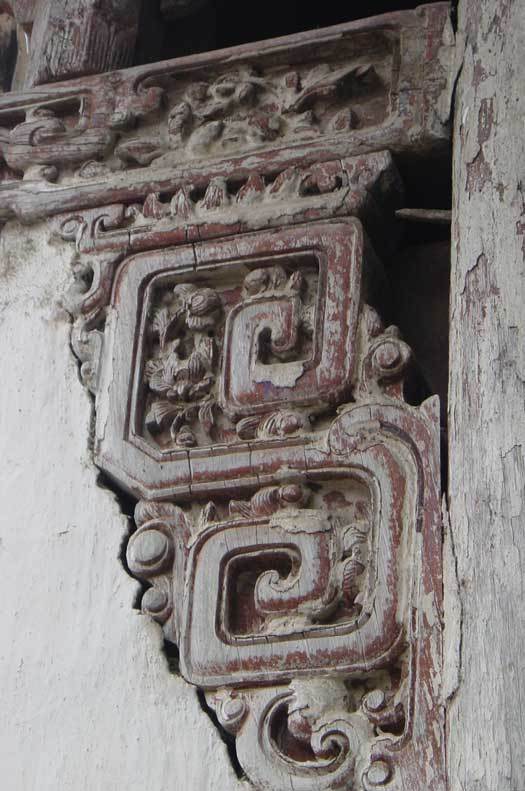 Bracket on the left-hand side