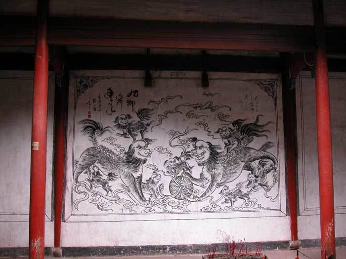 Painting of nine lions on the back wall