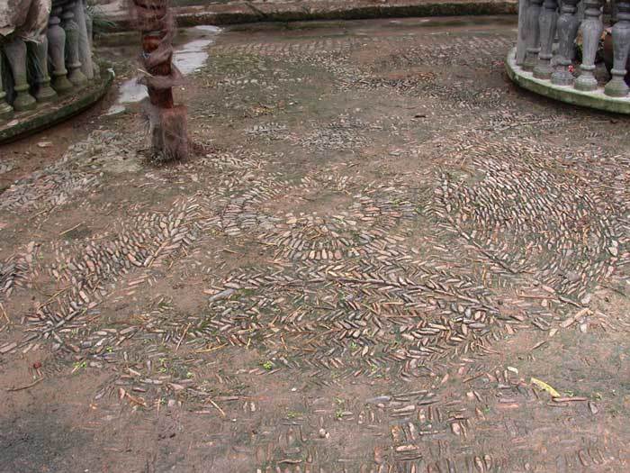 Circular stone pattern on the floor of the front courtyard