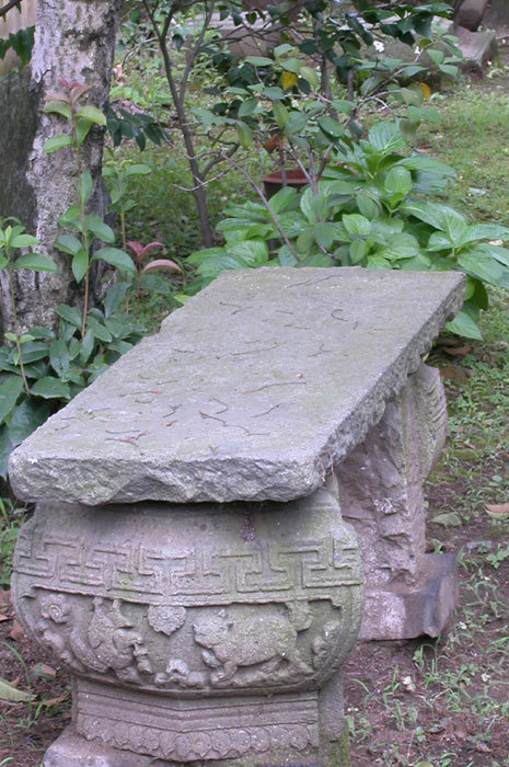 Carved stone bench Carved stone bench
