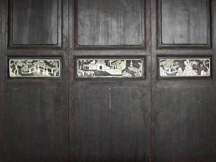 Panels with carvings on the stage