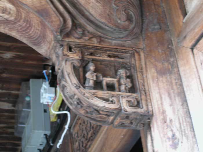 Beam on the northeastern corner.detailed carving on the right side of the beam