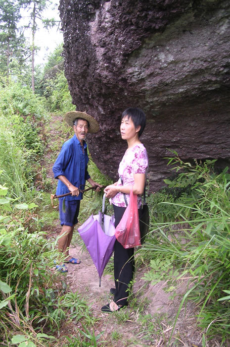 Large boulder overlooking tomb.