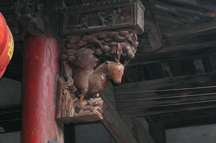 Bracket with deer carving Bracket with deer carving