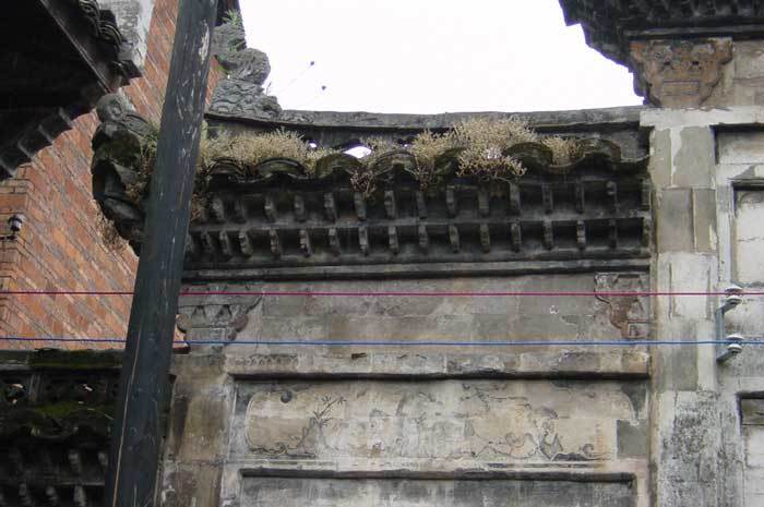 Looking through the front gate from the hall-Wall painting on the left-hand side of the front wall
