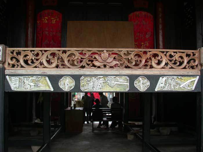 Carved decorations on the front side of the stage, the middle part Carved decorations on the front side of the stage, the middle part