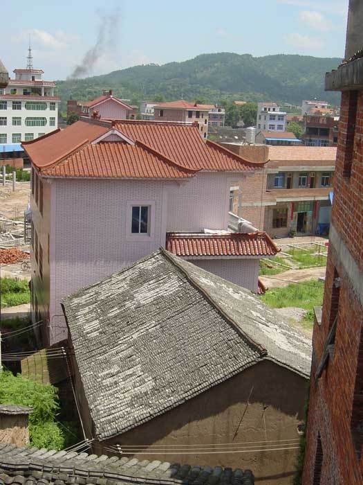 Old and new roofs from top of 5 floor building