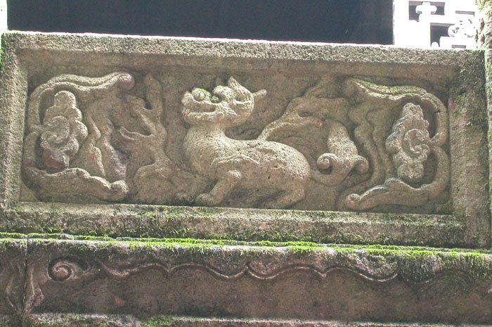 Stone carving of the central plaque, a unicorn Stone carving of the central plaque, a unicorn